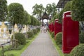 English phone booths in the park of Madame Nong Nooch.Tourists i