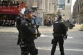 English policemen with machine guns in London , England