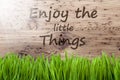 Bright Sunny Wooden Background, Gras, Quote Enjoy The Little Things Royalty Free Stock Photo