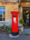 English Red Post Box in village Royalty Free Stock Photo