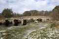 English river with old stone bridges on Dartmoor England UK