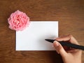 English rose and blank card for text on wood