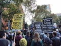 English and Spanish Language Signs, Anti-Trump Protest, Washington Square Park, NYC, NY, USA