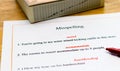 English spelling correction sheet on table Royalty Free Stock Photo