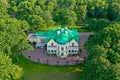 English-style cottage on a hill in Peterhof. Rural house in the park. Panoramic view from above