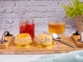 English style scones delicious freshly baked homemade, strawberry jam on a wooden tray. Royalty Free Stock Photo