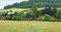 An English Summer Landscape with a Village in the Valley