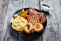 English Sunday roast on a black plate