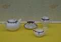 English teacup with saucer, teapot, sugar bowl and cream jug, fine bone china porcelain