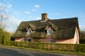 An english thatched cottage in the countryside Royalty Free Stock Photo