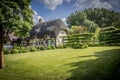 English Village Thatched Cottage and garden Royalty Free Stock Photo