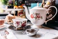 English Vintage Porcelain Roses Tea Sets including teapot, tea cup, plate, spoon and tea filter