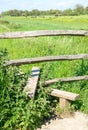 English wooden fence stile allowing access to field.