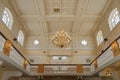 Engllish country house, golden chandelier. window and bannister