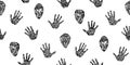 Engraved ancient handprint and mask seamless pattern. Endless hand drawn human palm prints and human face graphic vector Royalty Free Stock Photo