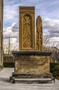 Engraved stone stele with cross on pedestal with inscription, dedicated to the centenary of the Armenian genocide