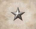 Engraving Christmas star glowing isolated on textured paper BG Royalty Free Stock Photo