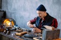 Engraving technique. talented man performing jewelry work