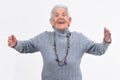 Enior woman hugging on white background