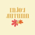 `Enjoy Autumn` lettering with autumn/fall leaves.