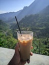 Enjoy the beauty of the Rahtawu Kudus mountains while drinking a glass of iced coffee