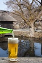 Enjoy beer in Oshino Hakkai village, Japan. Royalty Free Stock Photo