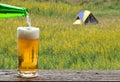 Enjoy beer in outdoor camp.