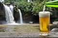 Enjoy beer with waterfall landscape.