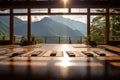 Enjoy the breathtaking beauty of mountains from this generously proportioned room, Landscape view of a peaceful yoga retreat in Royalty Free Stock Photo