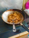 Enjoy Cooking fried rice on the pan at the kitchen