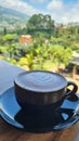 Enjoy a cup of coffee with beautiful mountain views.