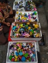 Bandung. West Java. Indonesia. August 03, 2022. A child is choosing his favorite toy at a toy seller. Royalty Free Stock Photo