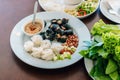 Enjoy eat with Vietnamese Meatball Wraps Nam-Neung, Pork Sausage wraps with fresh vegetables in rice paper, generous platter eat Royalty Free Stock Photo