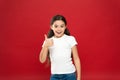 Enjoy every moment. Happy child girl with long hair on red background. Happiness and joy. Positive emotions. Child care Royalty Free Stock Photo