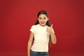 Enjoy every moment. Happy child girl with long hair on red background. Happiness and joy. Positive emotions. Child care Royalty Free Stock Photo