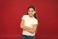 Enjoy every moment. Young and free. Happy child girl with long hair on red background. Happiness and joy. Positive Royalty Free Stock Photo