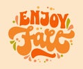 Enjoy Fall - draw fun phrase in 70s groovy style lettering. Autumn season trendy typography design. Modern bold lettering quote