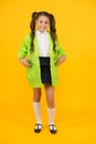 Enjoy fall weather with proper garments. Waterproof accessories make rainy fall day cheerful and pleasant. Schoolgirl in