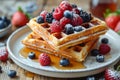 Enjoy a gourmet breakfast of crispy-edged waffles, bursting with the flavors of fresh berries