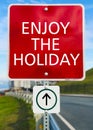 Enjoy the holiday red sign board Royalty Free Stock Photo