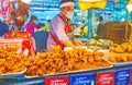 Enjoy the hot deep fried chicken, Talad Saphan Phut market, Bangkok, Thailand Royalty Free Stock Photo
