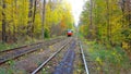 Tramline in autumn forest, Kiev, Ukraine