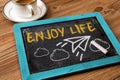 Enjoy life concept with paper plane hand drawn on blackboard Royalty Free Stock Photo