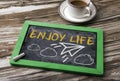 Enjoy life concept with paper plane hand drawn on blackboard Royalty Free Stock Photo
