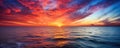 Enjoy the mesmerizing beauty of a sunset over the ocean, adorned with vibrant colors on the horizon Royalty Free Stock Photo