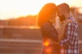 Enjoy moment. Serene couple touching foreheads, side view