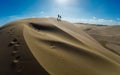 Enjoy people jumping on the sand dunes