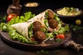 Enjoy the perfect combination of savory meatballs, fresh lettuce, and juicy tomatoes in this satisfying and nutritious wrap,