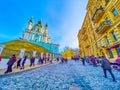 Enjoy pleasant walk along Andrew`s Descent in surrounding of historical landmarks and traditional tourist market, Kyiv, Ukraine