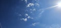 Beautiful billowing clouds (cumulus) in the deep blue sky.